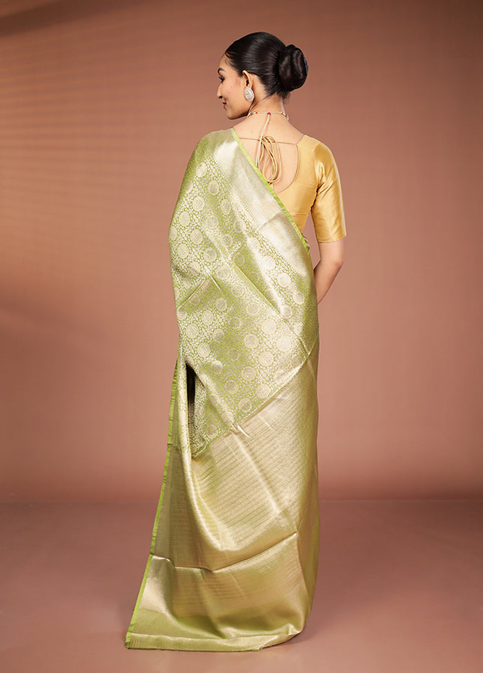 Green Tissue Silk Saree With Blouse Piece