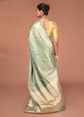 Green Tissue Silk Saree With Blouse Piece