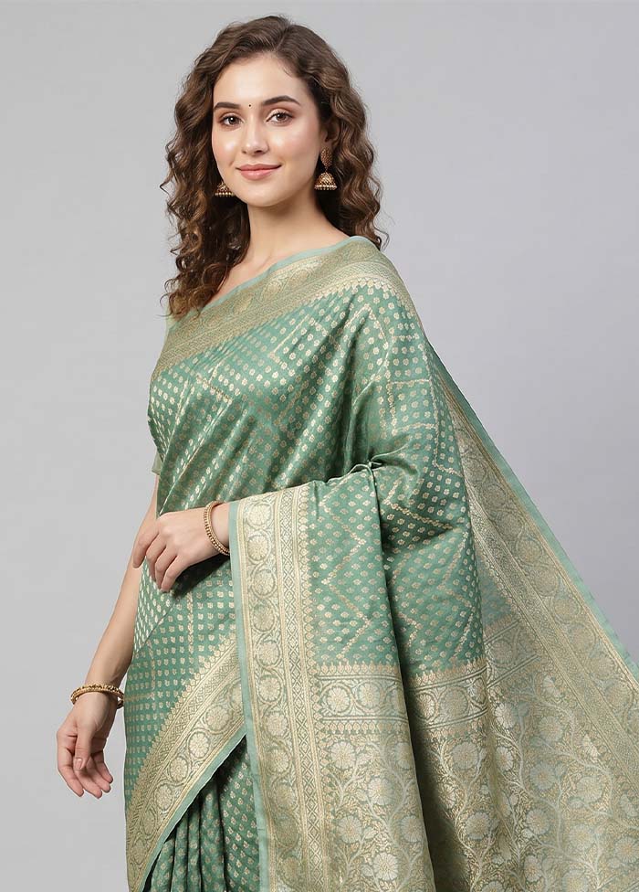 Green Tissue Silk Saree With Blouse Piece