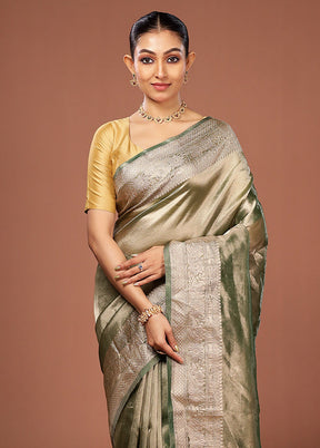 Green Tissue Silk Saree With Blouse Piece