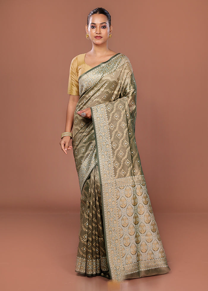 Green Tissue Silk Saree With Blouse Piece