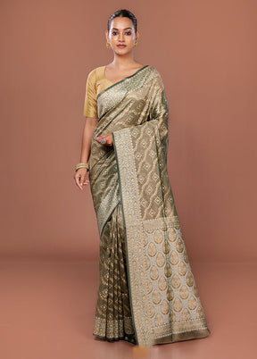 Green Tissue Silk Saree With Blouse Piece