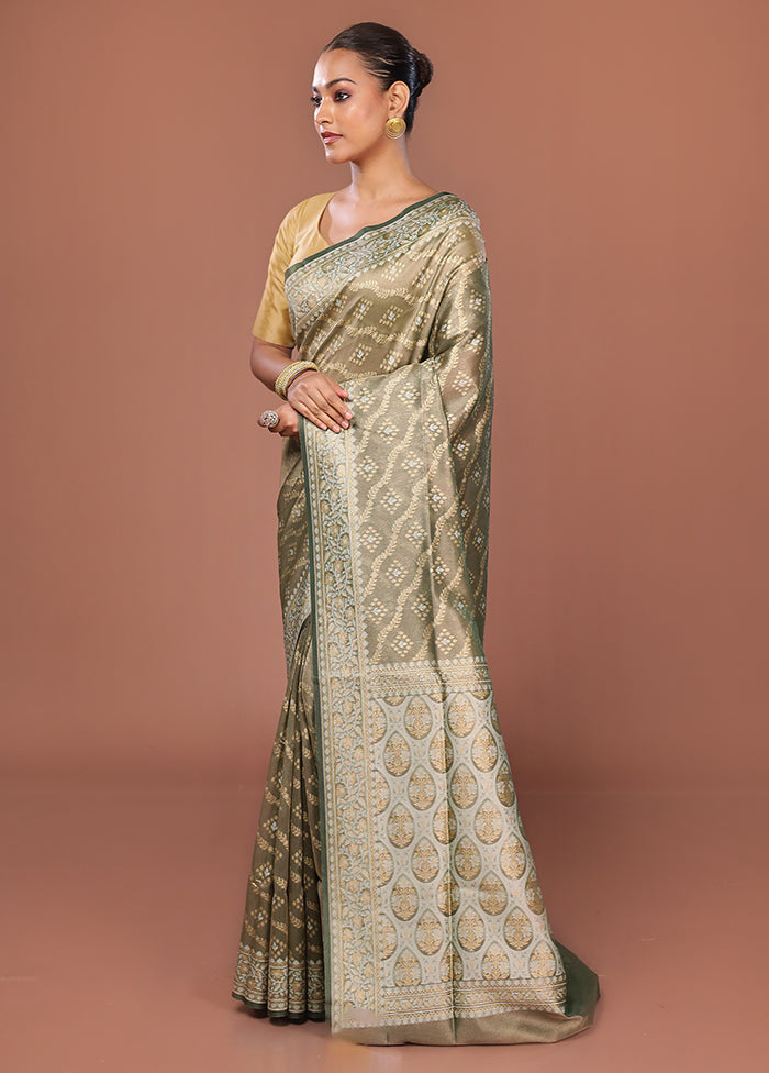 Green Tissue Silk Saree With Blouse Piece
