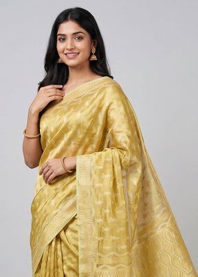 Cream Tissue Silk Saree With Blouse Piece