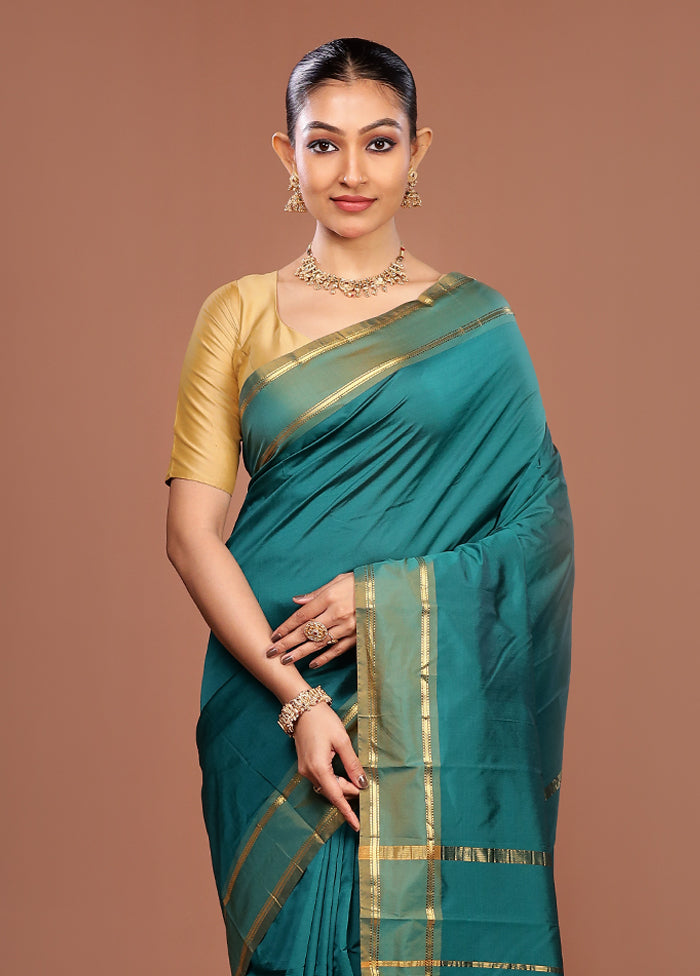 Green Kanjivaram Silk Saree With Blouse Piece