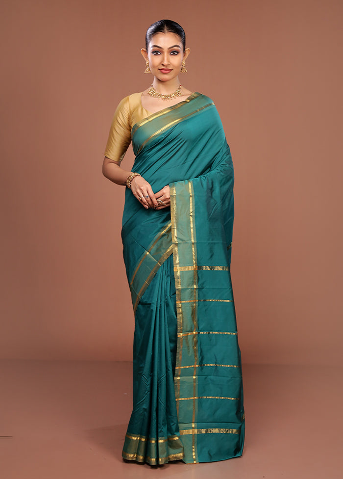 Green Kanjivaram Silk Saree With Blouse Piece