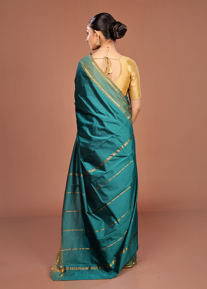 Green Kanjivaram Silk Saree With Blouse Piece