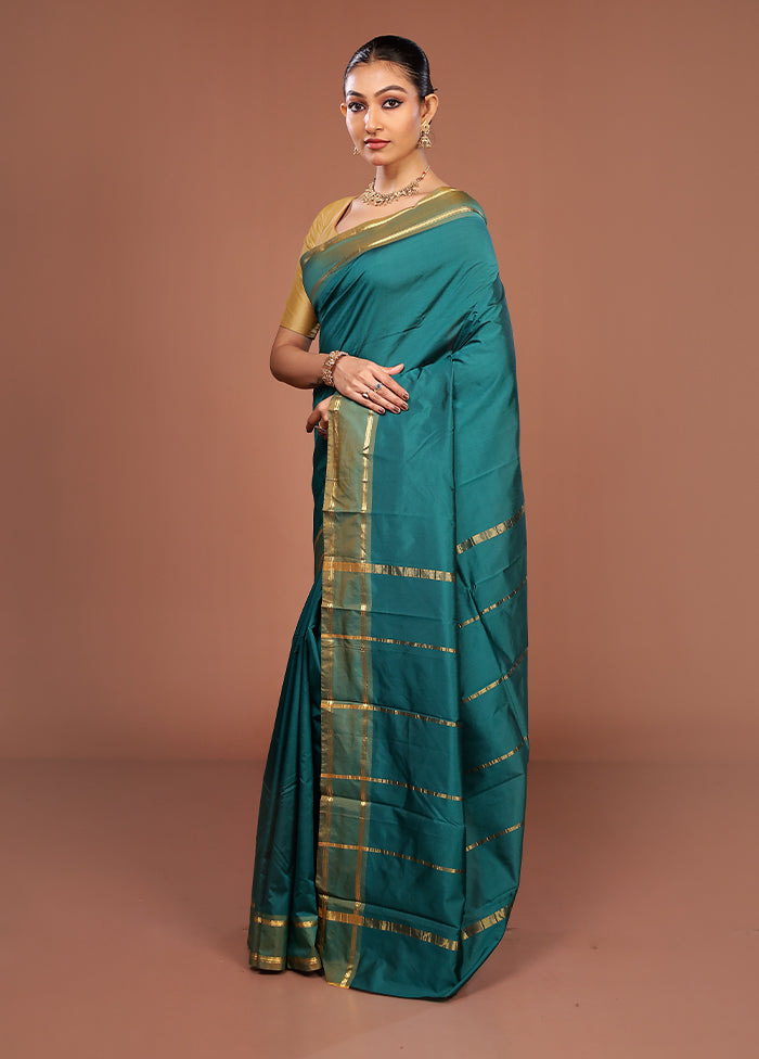 Green Kanjivaram Silk Saree With Blouse Piece