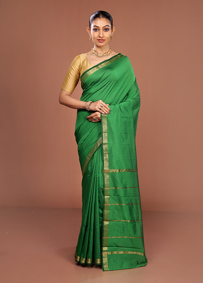 Green Kanjivaram Silk Saree With Blouse Piece