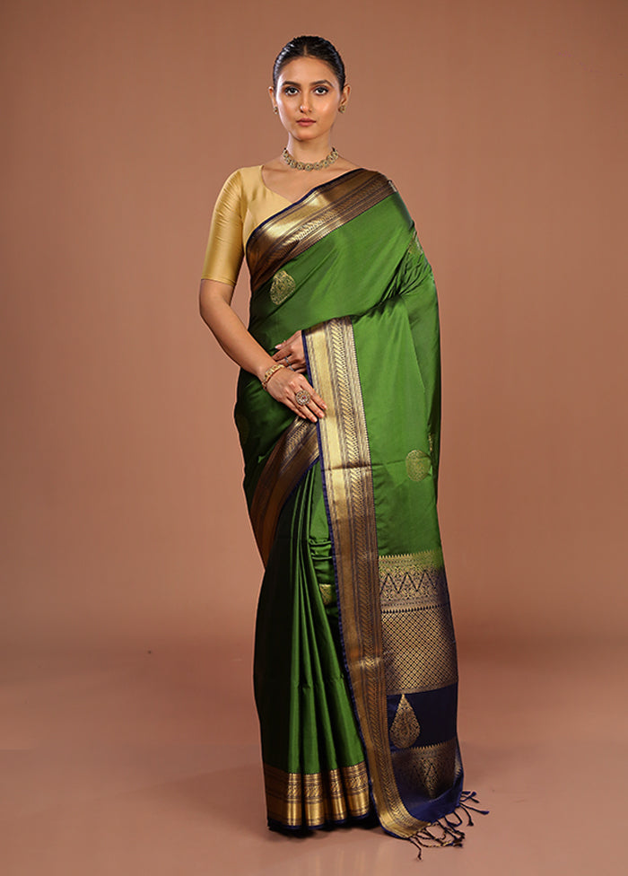 Green Kanjivaram Silk Saree With Blouse Piece