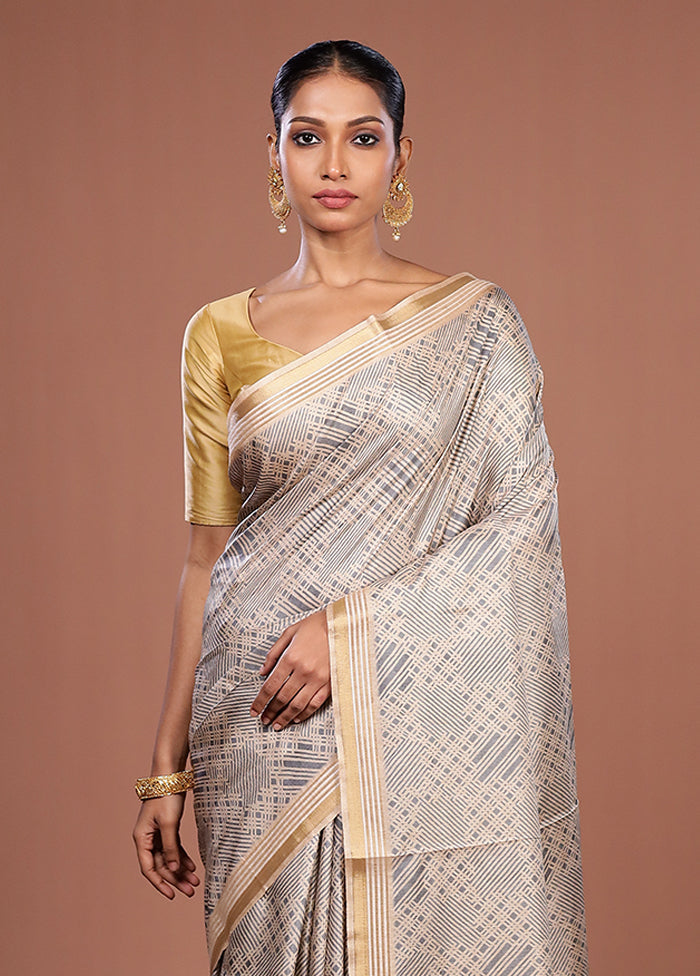 Cream Tussar Silk Saree With Blouse Piece