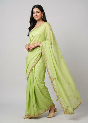 Green Tissue Silk Saree With Blouse Piece