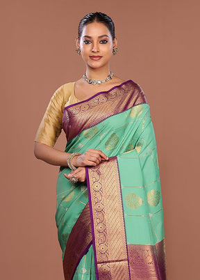 Green Kanjivaram Silk Saree With Blouse Piece