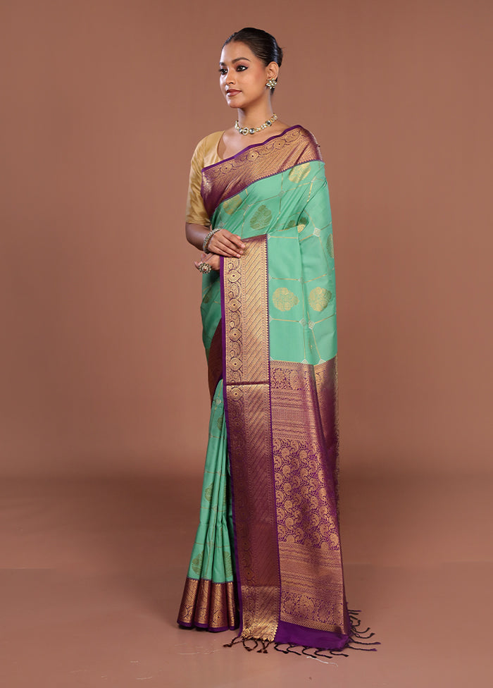 Green Kanjivaram Silk Saree With Blouse Piece