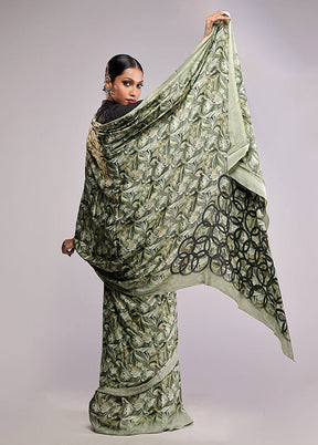 Green Printed Silk Saree With Blouse Piece
