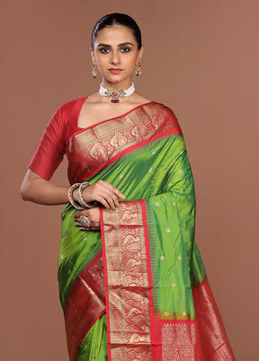 Green Kanjivaram Silk Saree With Blouse Piece