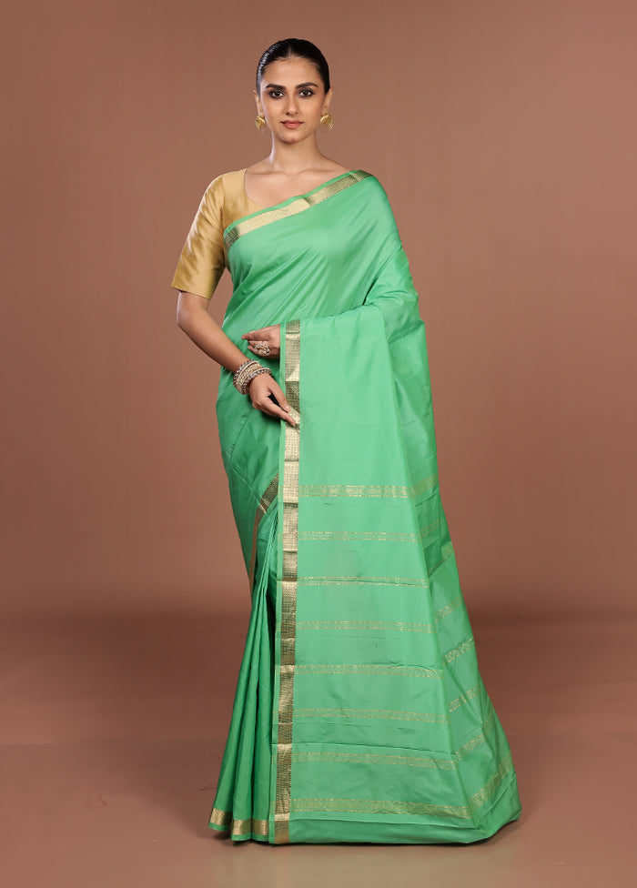 Green Kanjivaram Silk Saree With Blouse Piece