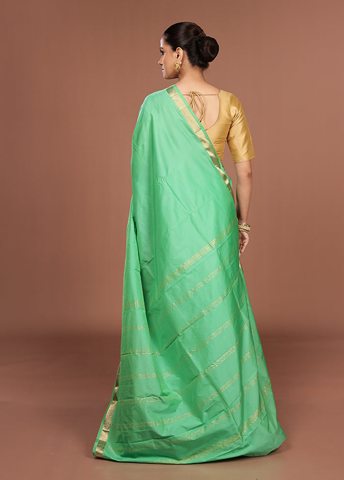Green Kanjivaram Silk Saree With Blouse Piece