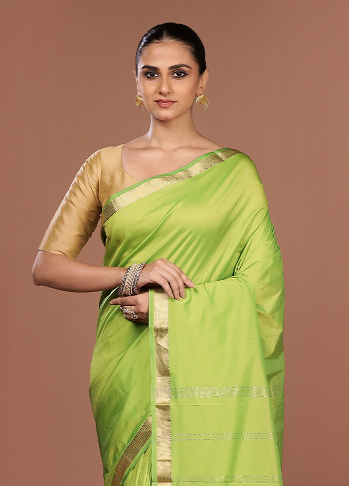 Green Kanjivaram Silk Saree With Blouse Piece