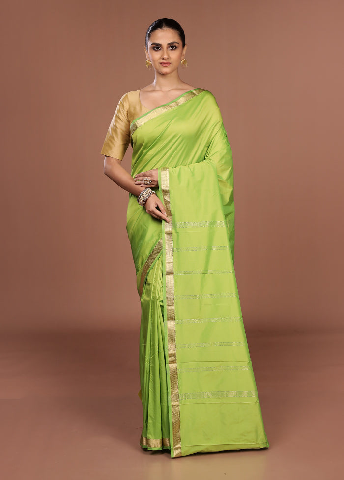 Green Kanjivaram Silk Saree With Blouse Piece