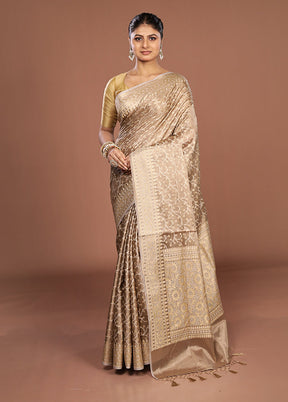 Cream Tissue Silk Saree With Blouse Piece