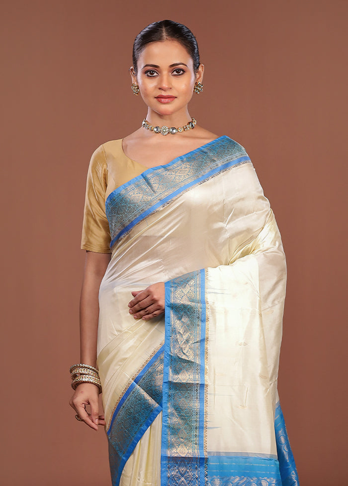 White Handloom Kanjivaram Pure Silk Saree With Blouse Piece
