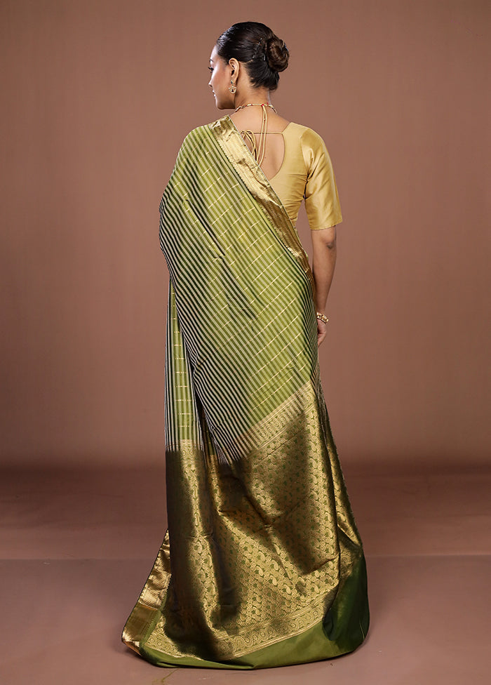 Green Kanjivaram Silk Saree With Blouse Piece