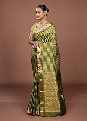Green Kanjivaram Silk Saree With Blouse Piece