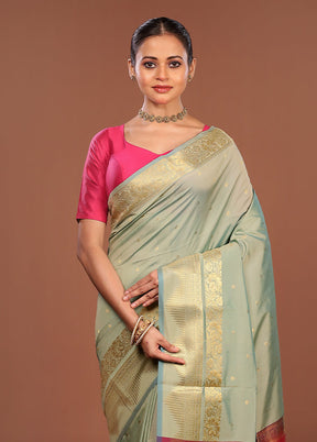 Green Kanjivaram Silk Saree With Blouse Piece