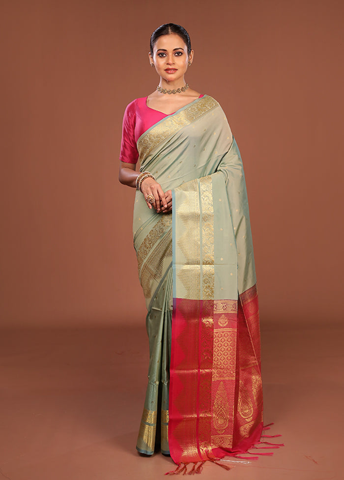 Green Kanjivaram Silk Saree With Blouse Piece