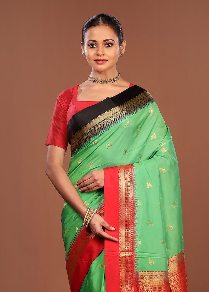 Green Kanjivaram Silk Saree With Blouse Piece