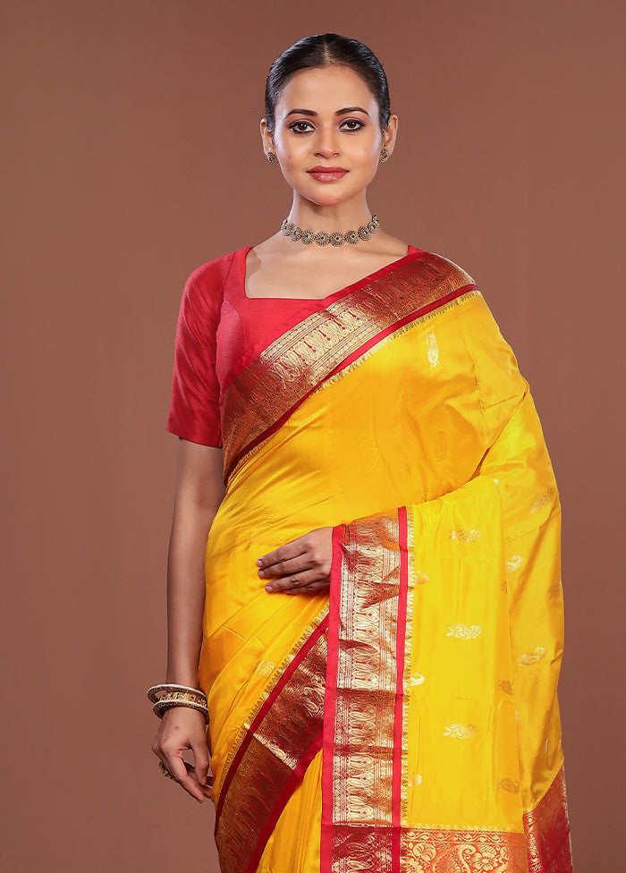 Yellow Handloom Kanjivaram Pure Silk Saree With Blouse Piece