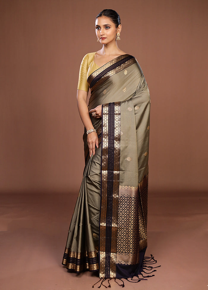 Green Kanjivaram Silk Saree With Blouse Piece