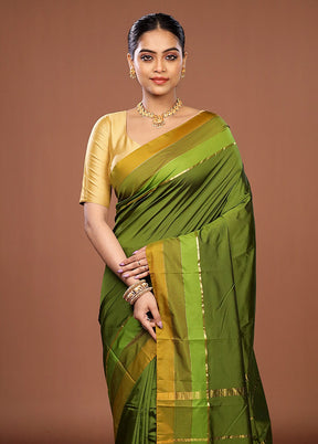 Green Kanjivaram Silk Saree With Blouse Piece