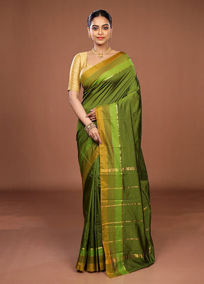 Green Kanjivaram Silk Saree With Blouse Piece