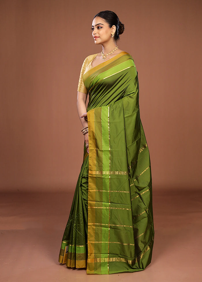 Green Kanjivaram Silk Saree With Blouse Piece