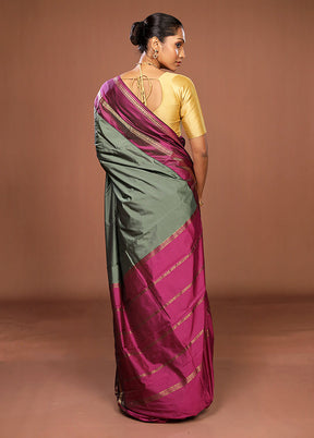 Green Kanjivaram Silk Saree With Blouse Piece