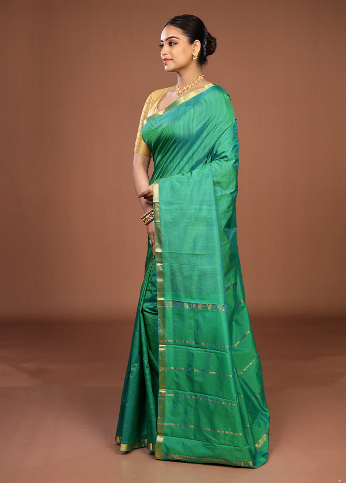 Green Kanjivaram Silk Saree With Blouse Piece