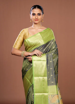 Green Kanjivaram Silk Saree With Blouse Piece