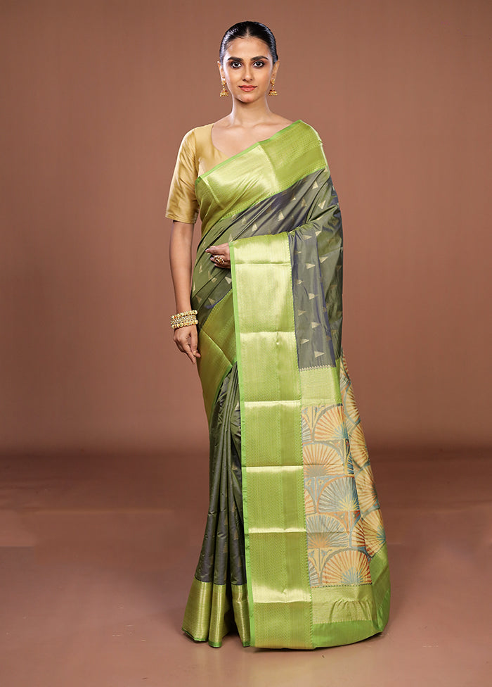 Green Kanjivaram Silk Saree With Blouse Piece