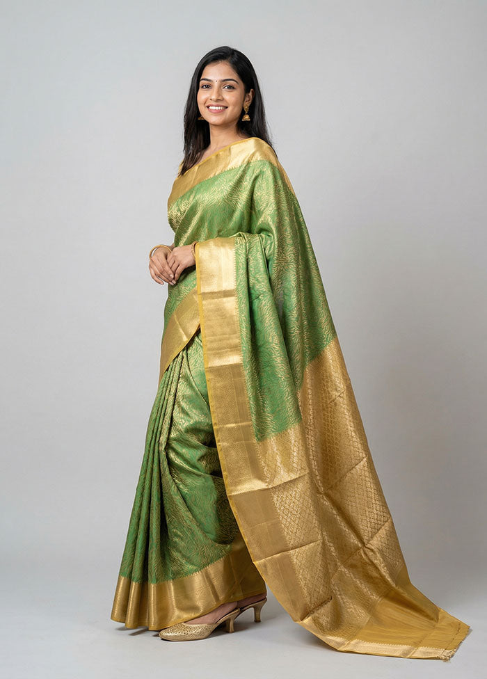 Green Kanjivaram Silk Saree With Blouse Piece