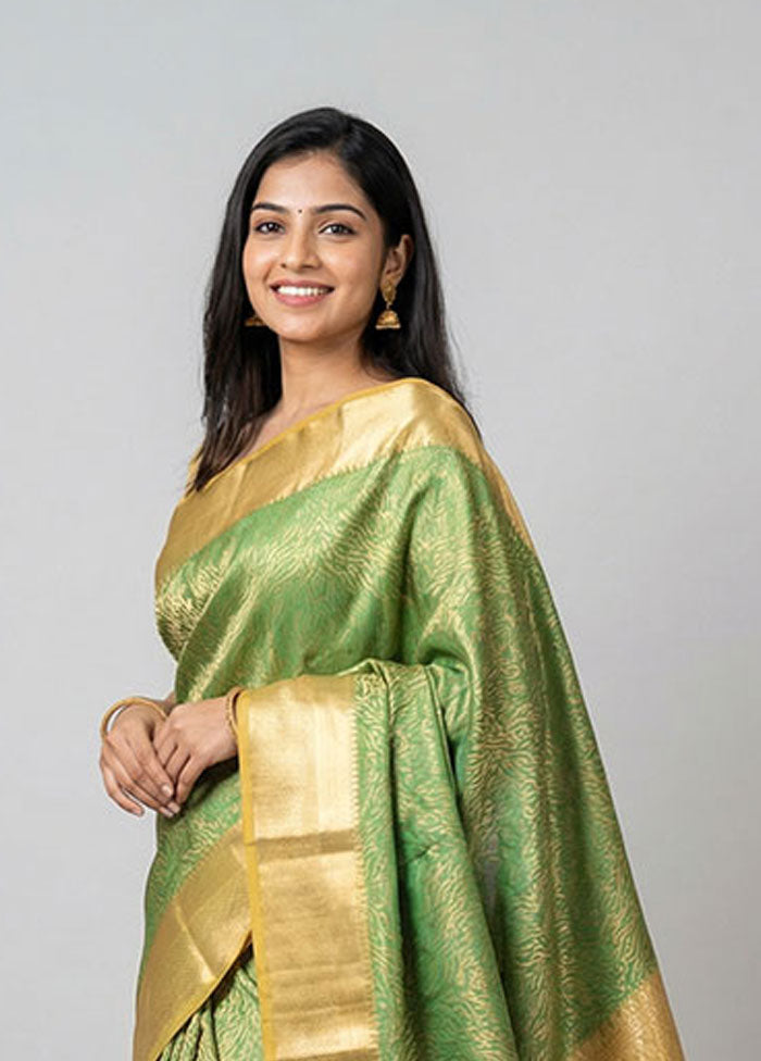 Green Kanjivaram Silk Saree With Blouse Piece