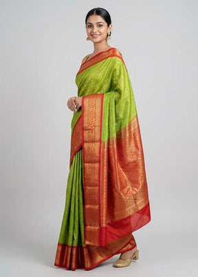 Green Kanjivaram Silk Saree With Blouse Piece