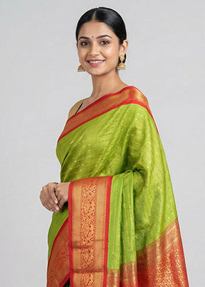 Green Kanjivaram Silk Saree With Blouse Piece