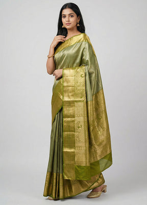 Green Kanjivaram Silk Saree With Blouse Piece