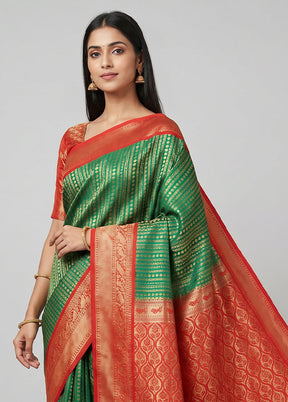Green Kanjivaram Silk Saree With Blouse Piece