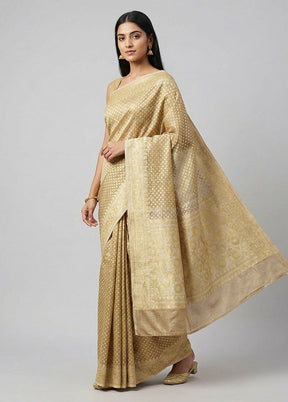 Cream Tissue Silk Saree With Blouse Piece
