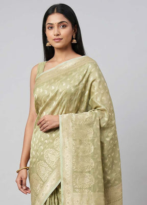 Green Tissue Silk Saree With Blouse Piece