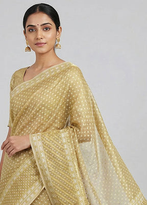 Cream Tissue Silk Saree With Blouse Piece