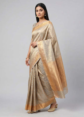 Cream Tissue Silk Saree With Blouse Piece